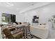 Contemporary living room with stylish seating, modern decor, and lots of natural light at 305 Sweetwater Club Cir, Longwood, FL 32779