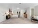 Spacious and bright main bedroom features light wood floors, neutral decor, and plenty of natural light at 305 Sweetwater Club Cir, Longwood, FL 32779