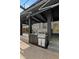 This outdoor kitchen is equipped with a built-in grill and countertop space, perfect for entertaining at 305 Sweetwater Club Cir, Longwood, FL 32779