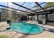 Beautiful swimming pool and spa area with a screened enclosure and ample patio space at 305 Sweetwater Club Cir, Longwood, FL 32779