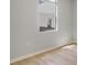 Bright room featuring light wood flooring and natural light from a large window at 3397 Tranquil Trl, Kissimmee, FL 34747