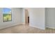 Bright room with light wood flooring, large window, and open doorway to a walk-in closet at 3397 Tranquil Trl, Kissimmee, FL 34747