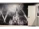 Room featuring a whimsical custom Disney Castle mural and a white door at 3397 Tranquil Trl, Kissimmee, FL 34747