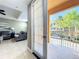 Private balcony overlooking manicured landscaping, offering scenic views of the surrounding community at 728 Greybull Run, Lake Mary, FL 32746