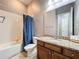 Bathroom featuring bathtub, shower, and vanity with granite counters at 728 Greybull Run, Lake Mary, FL 32746