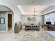 Open-concept dining area adjacent to the kitchen, featuring modern decor at 728 Greybull Run, Lake Mary, FL 32746