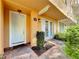 Close up of charming townhome front entrance featuring a light blue door and brick-paver walkway at 728 Greybull Run, Lake Mary, FL 32746