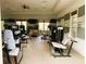 Community gym showcasing machines, neutral paint, and large windows at 728 Greybull Run, Lake Mary, FL 32746
