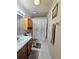 Cozy bathroom with a coordinated shower curtain, rug, and towel set at 1016 Monroe Ave, St Cloud, FL 34769