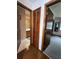 Hallway with multiple entrances to the bathroom, bedroom, and a closet at 1016 Monroe Ave, St Cloud, FL 34769