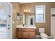 The bathroom has a modern vanity and fixtures, providing both style and functionality at 11720 Indian Hills Ln, Clermont, FL 34711