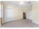 The bedroom offers ample closet space and a bright atmosphere thanks to the natural light at 11720 Indian Hills Ln, Clermont, FL 34711