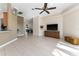 Bright living room with tile flooring, ceiling fan, and recessed lighting at 11720 Indian Hills Ln, Clermont, FL 34711
