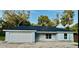 Charming single-story home with a two-car garage and a well-maintained yard and modern roof at 13075 Se 35Th Ct, Belleview, FL 34420