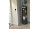 Close up of an installed Rheem water heater with blue expansion tank at 13075 Se 35Th Ct, Belleview, FL 34420