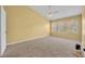 The main bedroom has a ceiling fan and 3 windows at 1541 Florentino Ln, Winter Park, FL 32792