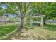 Picturesque gazebo nestled in a grassy area, providing a shaded seating area for relaxation at 1541 Florentino Ln, Winter Park, FL 32792