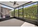 Relaxing screened-in patio with ceiling fan, offering a great outdoor living space at 1541 Florentino Ln, Winter Park, FL 32792