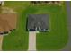 An aerial shot shows this home's spacious lot and impeccable landscaping in a desirable neighborhood at 16697 Sw 23Rd Avenue Rd, Ocala, FL 34473