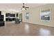 Open-concept living space with tile flooring and abundant natural light, great for entertaining at 2200 Rapollo Dr, Kissimmee, FL 34741