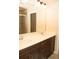 Modern bathroom featuring dual sinks, sleek cabinetry, and contemporary design elements at 2260 Rapollo Dr, Kissimmee, FL 34741