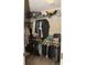 Walk-in closet features ample storage with shelving, hanging rods, and neutral carpeting at 2260 Rapollo Dr, Kissimmee, FL 34741