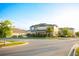 Beautiful two-story home boasts lush landscaping, privacy hedges, and inviting curb appeal at 2260 Rapollo Dr, Kissimmee, FL 34741