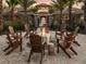 Inviting outdoor area with a fire pit surrounded by Adirondack chairs, perfect for cozy evenings at 2260 Rapollo Dr, Kissimmee, FL 34741