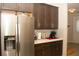 Kitchen featuring stainless steel refrigerator and granite counters at 2260 Rapollo Dr, Kissimmee, FL 34741