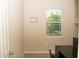 This home office offers a serene workspace with a view of the outdoors and great natural light at 2260 Rapollo Dr, Kissimmee, FL 34741