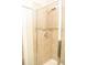 Modern shower stall featuring tiled walls and a contemporary shower head, providing a luxurious bathing experience at 2260 Rapollo Dr, Kissimmee, FL 34741