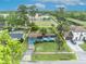 Aerial view of the property showcases the layout, lush landscaping, and neighborhood context at 2565 Brookshire Ave, Winter Park, FL 32792