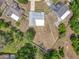 Aerial view shows a well-maintained home with large backyard and privacy fence at 2617 Greywall Ave, Ocoee, FL 34761