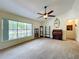Bright living room featuring a large window and stylish furnishings at 2617 Greywall Ave, Ocoee, FL 34761