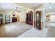 Spacious living room with carpet flooring and an open layout flowing into other living spaces at 2617 Greywall Ave, Ocoee, FL 34761