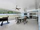 Spacious screened patio with ceiling fans and backyard, ideal for outdoor gatherings at 2617 Greywall Ave, Ocoee, FL 34761