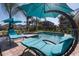 Backyard featuring lounge chairs, a spa, and a swimming pool at 291 Pendant Ct, Kissimmee, FL 34747