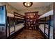 Fun bunk bedroom complete with a bookcase full of colorful books at 291 Pendant Ct, Kissimmee, FL 34747