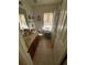 Functional bathroom featuring a vanity with a sink, toilet, and a shower-tub combination with a patterned shower curtain at 3020 Norlina St, Deltona, FL 32738