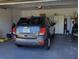 Spacious two-car garage featuring ample storage space and a parked SUV at 3020 Norlina St, Deltona, FL 32738