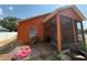 Cozy screened patio perfect for enjoying the outdoors in comfort and style at 3020 Norlina St, Deltona, FL 32738