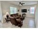 Inviting living room with comfortable seating, ceiling fan, and neutral tones at 3024 Meleto Blvd, New Smyrna Beach, FL 32168