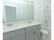 Bright bathroom featuring double sinks, a tile floor, and a tub with shower at 326 Wayland Dr, Haines City, FL 33844