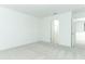 Bright bedroom featuring neutral paint, carpet flooring and an ensuite bathroom at 326 Wayland Dr, Haines City, FL 33844