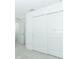 Bedroom showcasing sliding door closet and neutral carpet at 326 Wayland Dr, Haines City, FL 33844