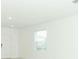 Bright living room featuring hard surface flooring, neutral walls and a double hung window at 326 Wayland Dr, Haines City, FL 33844