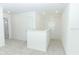 Hallway upstairs with neutral walls, carpet, and a window at 326 Wayland Dr, Haines City, FL 33844