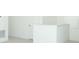 Hallway upstairs with neutral walls, carpet, and a window at 326 Wayland Dr, Haines City, FL 33844