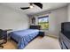 Bedroom features include a ceiling fan and window providing natural light at 3428 Deer Oak Cir, Oviedo, FL 32766
