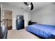 Bedroom features include a ceiling fan, closet, TV, desk and dresser at 3428 Deer Oak Cir, Oviedo, FL 32766